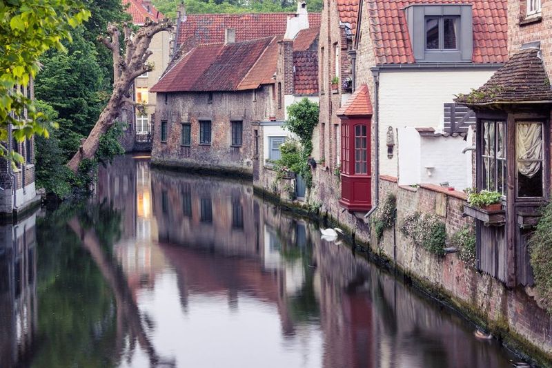 Bruges: Guided Tour & Boat Ride with Optional Beer Tasting - Burg Square and Markt with the Belfry: Bruges’ civic heart