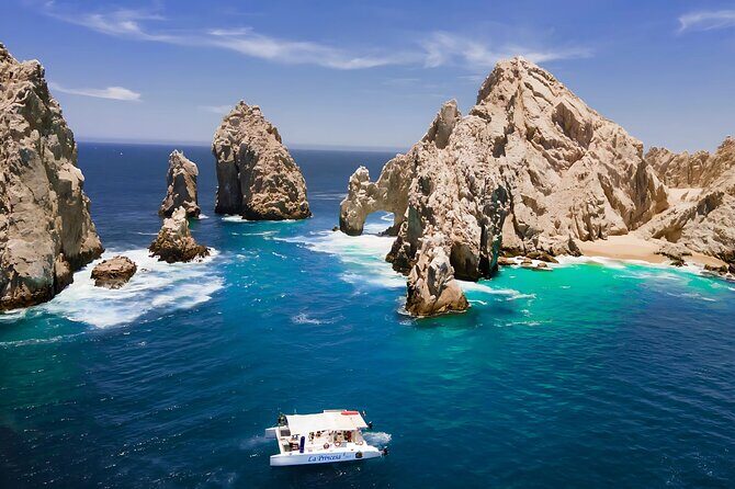 Cabo Catamaran Tour: Snorkeling & Unlimited Drinks Included - Exploring the Cabo Catamaran Tour: Snorkeling & Unlimited Drinks
