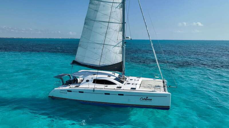 Cancun: Isla Mujeres Catamaran + Coco Bongo Show - The Real Deal for Travelers