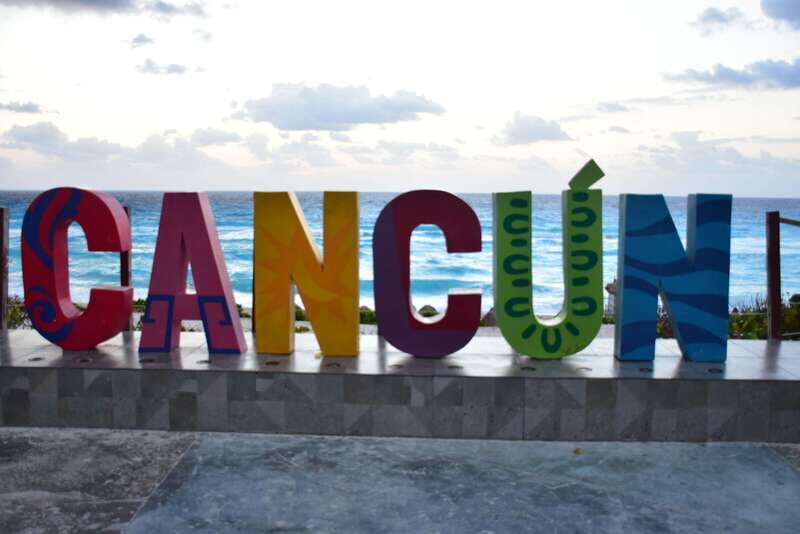 Cancun: Van Tour - City Adventure around the Best Stops - Starting with Playa Delfines: The Classic Photo Op