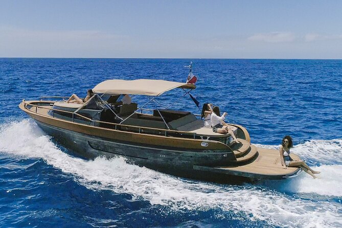 Capri Boat Tour from Naples – Small Group, Swim & Relax - Faraglioni: the rocks that look photoshopped in real life