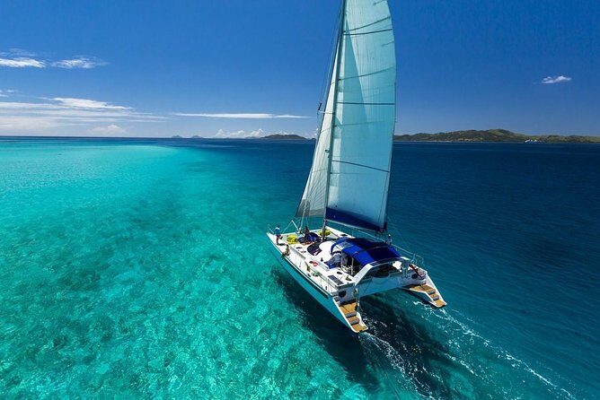 Catamaran adventure to Isla Mujeres with Snorkel,Buffet,Open Bar and Beach Club - Additional Activities and Atmosphere