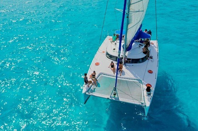 Catamaran Tour to Isla Mujeres Snorkeling with Buffet and Open Bar - The Sum Up