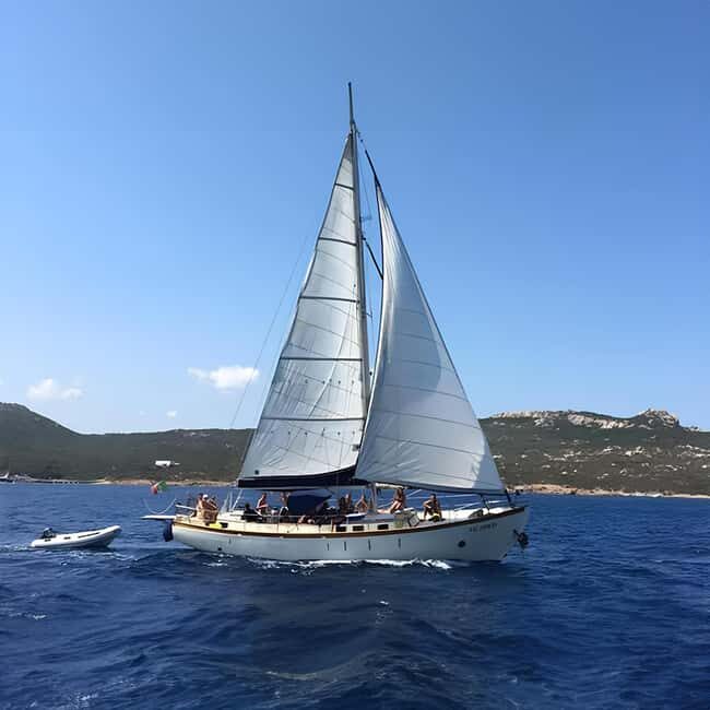 Catania: Boat Trip with Aperitif, Prosecco and Snorkeling - The Water Activities: Snorkeling and Paddleboarding