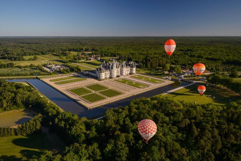 Chambord: Entry Ticket to the Castle - French Renaissance on full volume: towers, domes, ceilings, and fireplaces