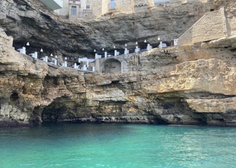 Coast and caves of Polignano:boat tours,drinks,swimming,music and fun - Key Points