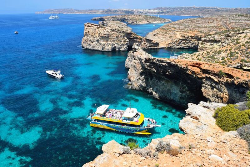 Comino: Blue Lagoon, Crystal Lagoon, and Seacaves Tour - Cruise Past Sea Caves and Santa Maria Highlights