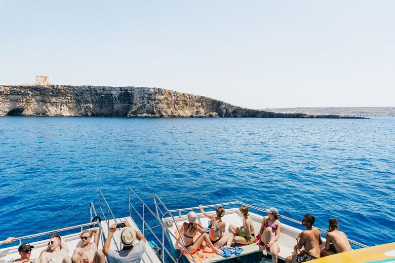 Comino: Blue Lagoon, Crystal Lagoon, and Seacaves Tour - Blue Lagoon Stop: White Sand, Clear Water, Easy Entry