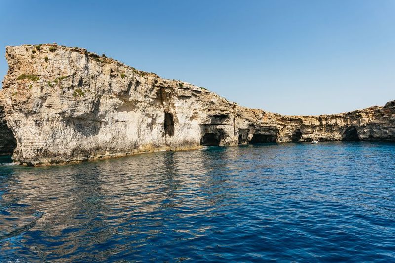 Comino: Blue Lagoon, Crystal Lagoon, and Seacaves Tour - Crystal Lagoon in Season: Bright Turquoise, Weather Dependent