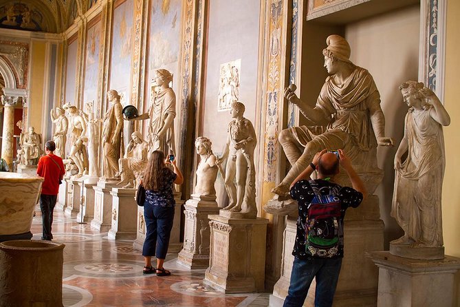 Complete Vatican: Museums, Sistine Chapel & St Peters Basilica - Cortile della Pigna and classic sculpture: a camera-friendly break from fresco overload