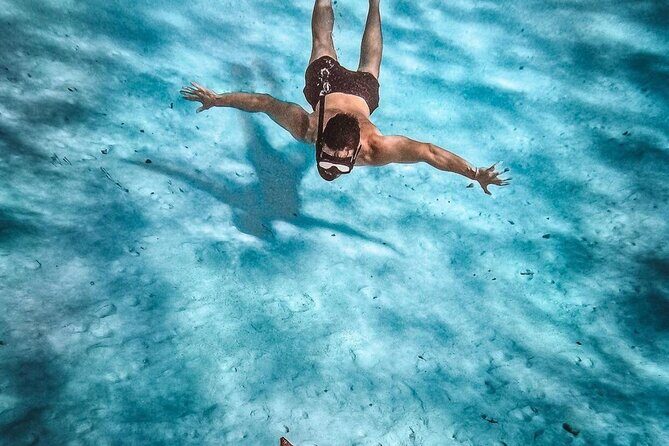 Cozumel Catamaran Tour: Snorkel at Top Reefs & Open Bar - The Sum Up