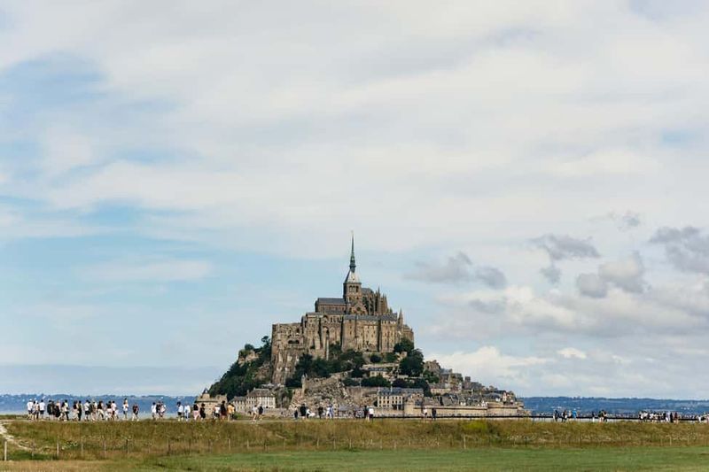 Day Trip to Mont-Saint-Michel from Paris - Getting From Parking to Abbey: Shuttles, Lines, and How to Avoid Stress