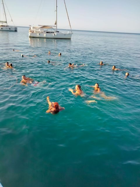 Denia: Cova Tallada Catamaran Tour and Swimming Stop - A Relaxing Sea Escape: Denia’s Cova Tallada Catamaran Tour and Swimming Stop