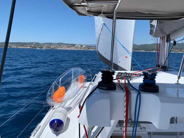 Departure from BRUSC sunset on sailing catamaran - Key Points