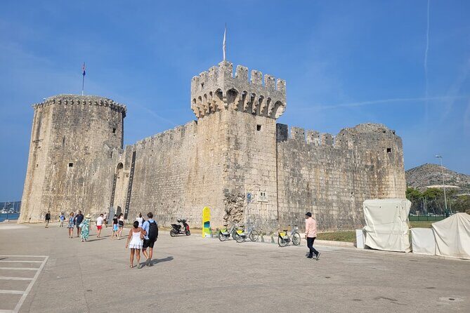 Discover Krka Waterfalls, Explore Trogir and Enjoy a Swim - Boat Ride and Skradin