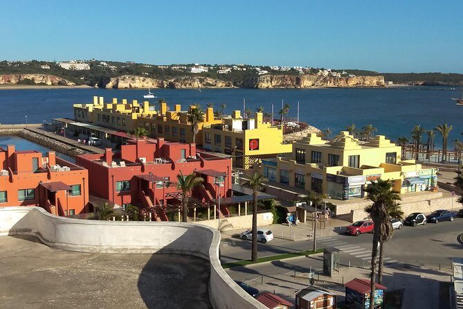 Discover Sagres & Lagos & Portimao ( Full Day Private Van Tour ) - Stop 5: Praia da Rocha and Portimão Marina