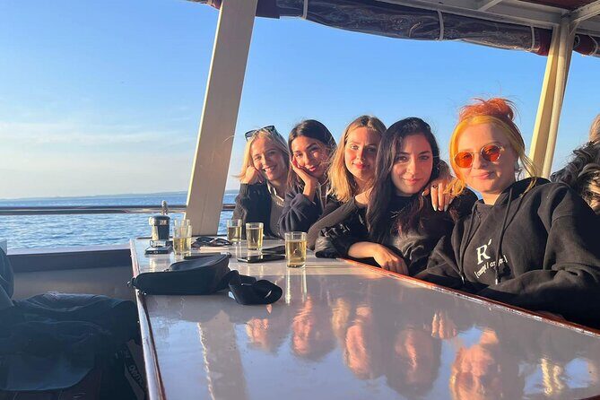 Dolphin Watching & Sunset Boat Tour With Dinner and Drinks - Key Points