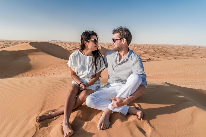 Dubai Desert Discovery: Red Dunes Safari, Sandboard & Camel Ride - Lahbab arrival: red dunes, quick camel moments, and photo time