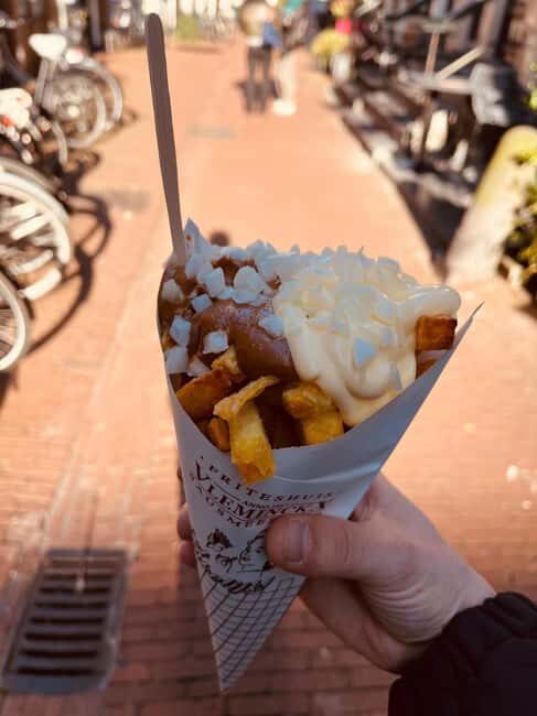 Eat & Drink Amsterdam: A Cozy Culinary Tour with Local Beer - The Guide and Group Experience