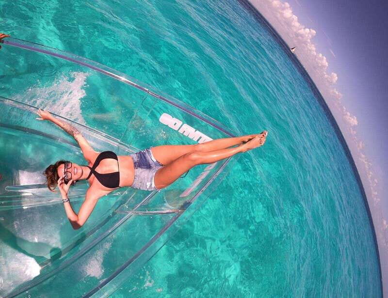 Explore the sea of cozumel in a transprent boat with drinks and snorkel. - What to Expect on This Tour