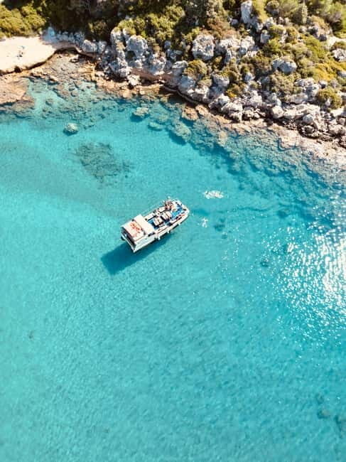 Faliraki: Boat Trip to Anthony Quinn & The Caves with Drinks - Key Points