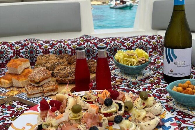 Favignana inflatable boat tour, wine tasting, snorkeling and relaxation - Exploring Favignana Town