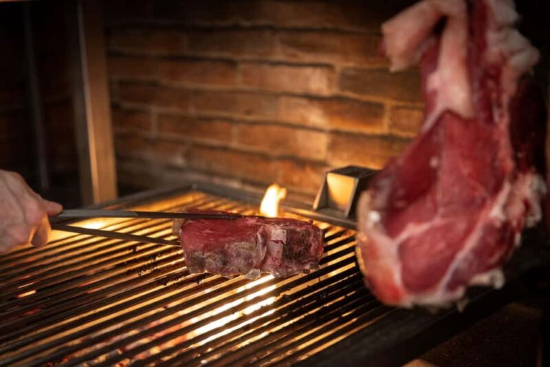 Florence: Live Grill Show & Steak Dinner with Wine - Key Points