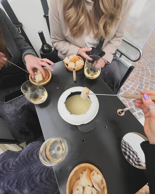 Fondue and wine private Tuk Tuk tour in Geneva - Key Points