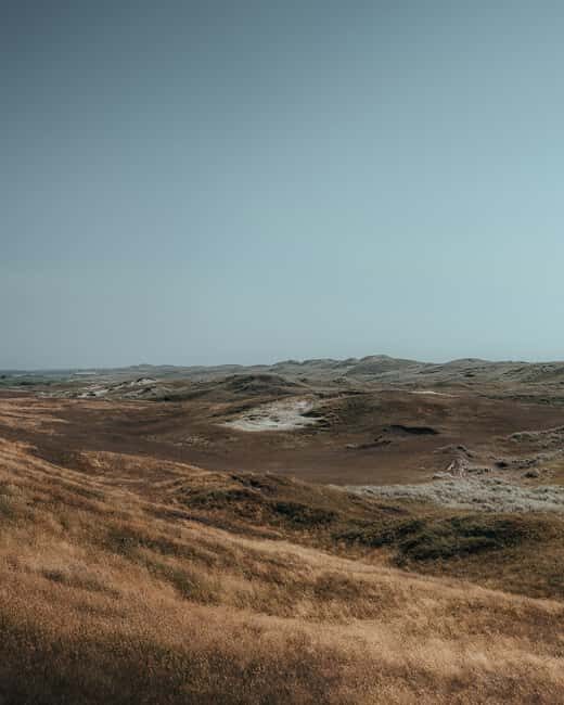 From Amsterdam: Dunes, Submarine & Windmills Guided Day Tour - FAQ