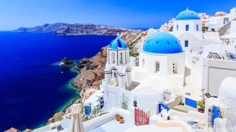 From Heraklion/Crete: Santorini Island Guided Day Trip - The drive to Fira: from sunset-adjacent vibes to the cliff-top capital