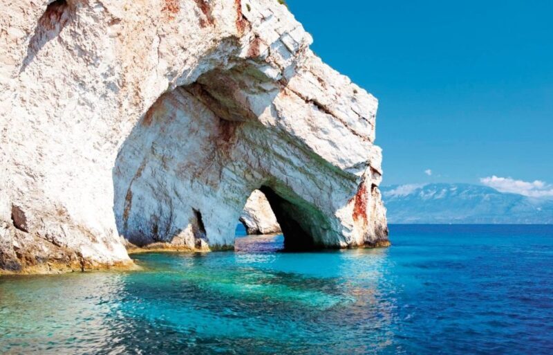 From Kefalonia: Blue Cave Boat Cruise & Shipwreck Photo Stop - Secluded Swimming & Coves