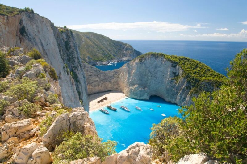 From Kefalonia: Blue Cave Boat Cruise & Shipwreck Photo Stop - Authentic Greek Village & Local Flavors