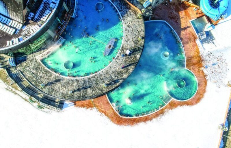 From Krakow: Snowmobile adventure and Thermal Baths tour - Key Points