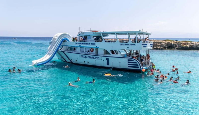 FROM LATCHI: Blue Lagoon Akamas Cruise - large water slide - The Water Slide and Snorkeling Adventure
