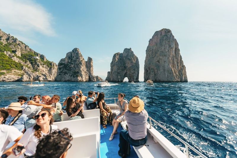 From Naples: Gulf of Naples & Capri Sightseeing Boat Tour - Faraglioni by boat: the postcard rocks in real scale