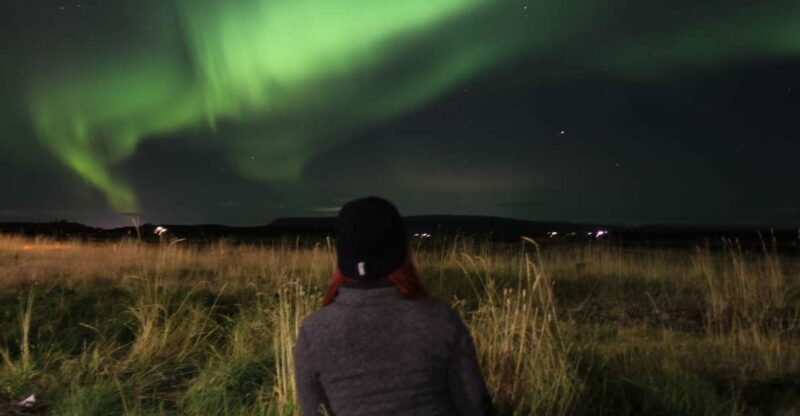From Reykjavík: Spot the Northern Lights with Snacks & Drink - Key Points