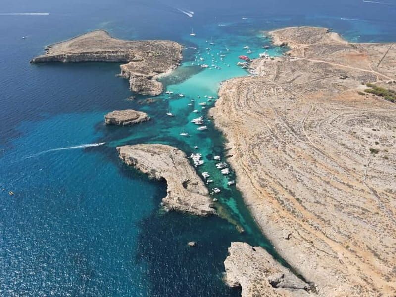 Sliema: Cruise to Comino, Crystal Lagoon, and Blue Lagoon - On-board setup: seating, toilets, and the waterslide