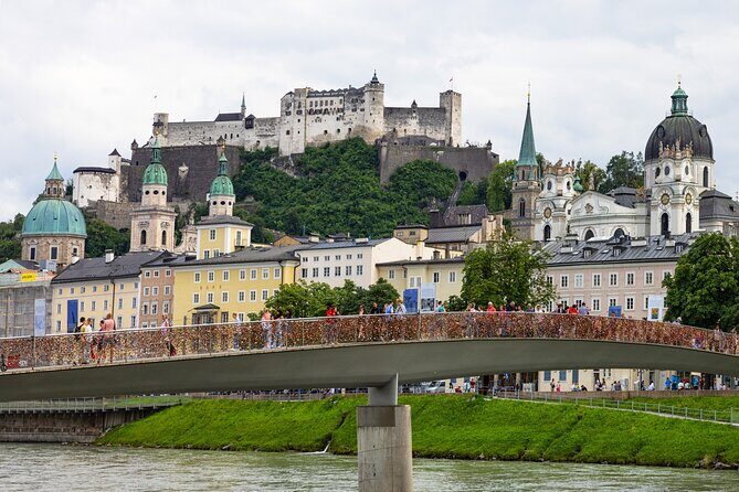 From Vienna: Day Tour to Hallstatt and Salzburg with Boat Ride - An Overview of the Tour Experience