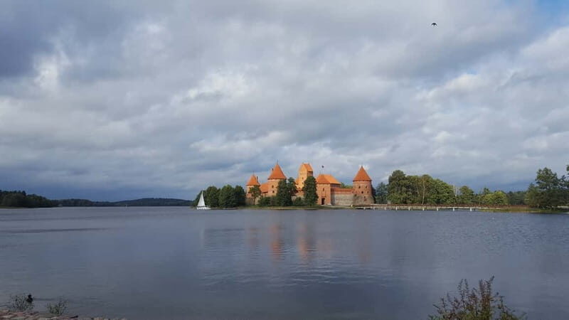 From Vilnius: Trakai Castle and Paneriai Memorial Tour - Transportation and Group Size