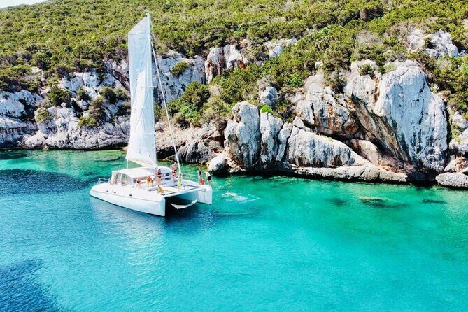 Full day Catamaran cruise in Porto Conte Natural Park - Who Should Book This Tour?