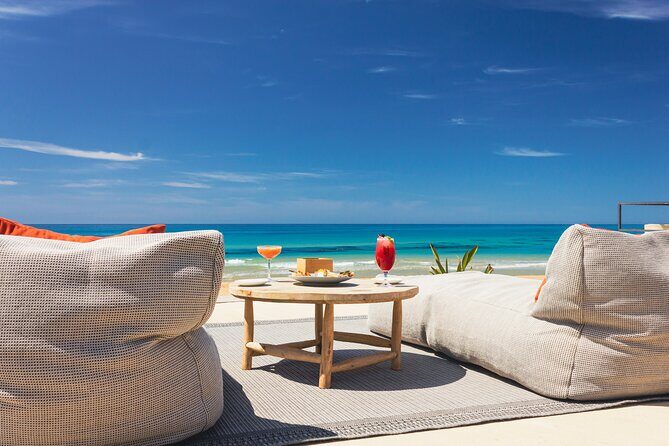 Full Day Pass to Cala Manbrù Beach Club - Key Points