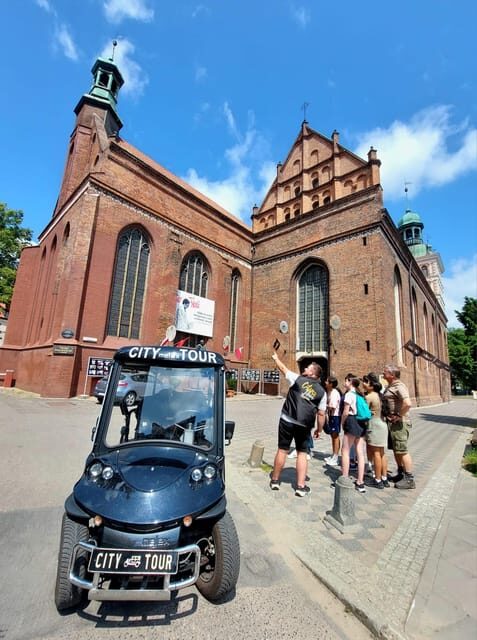 Gdansk: City Sightseeing Tour by Golf Cart LIVE GUIDE 60 min - Key Points