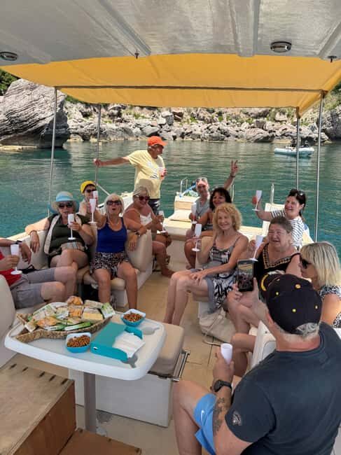 Giardini-Naxos: Sunset Boat Tour with Aperitif and Dolphins - Who Should Book This Tour?