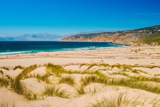 Group Tour to Sintra, Pena, Regaleira, Cabo da Roca & Cascais - Pena Palace in the clouds: the fairy-tale exterior you can’t fake