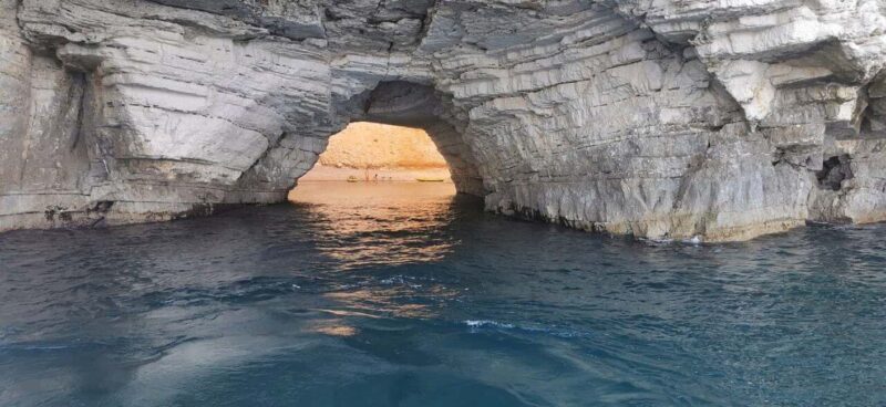 Guided boat tour of the Gargano Coast: caves, bays, and tradition - The Swim Stop at Baia delle Zagare