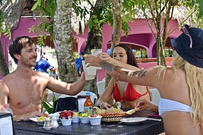 Guided Day Tour in Cozumel on a Clear Boat and Electric Scooter - The Sum Up