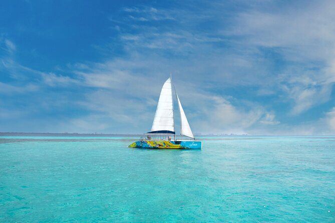 Guided Full Day Catamaran Isla Mujeres Pleasure Tour in Cancun - Key Points