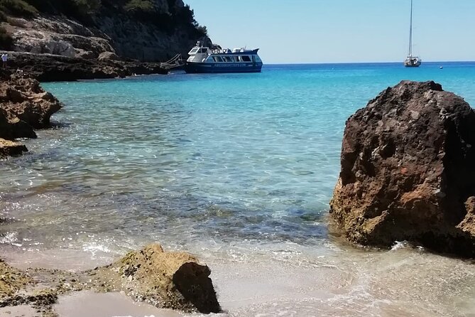 Half-Day Boat Tour along The South Coast of Menorca - Onboard setup: restroom, coffee bar, and snorkel-ready moments