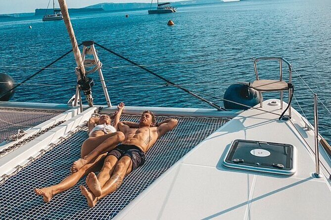 Half-Day Exclusive Catamaran Cruise in Santorini with Meal and Open Bar - What to Expect from the Cruise