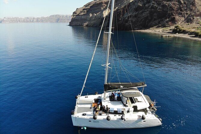 Half-Day Exclusive Catamaran Cruise in Santorini with Meal and Open Bar - The Crew and Service